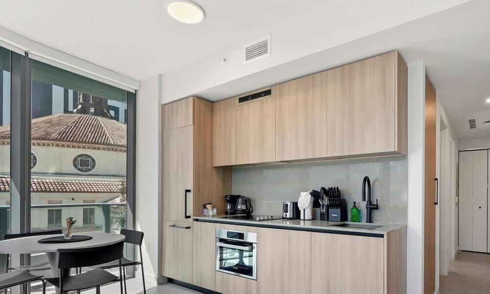 Fully equipped kitchen with modern appliances.
