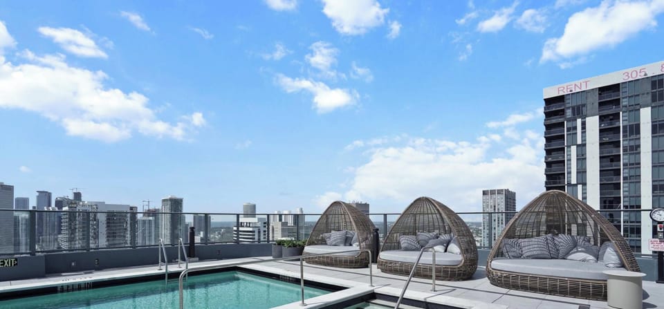 Take in panoramic city views from the pool!