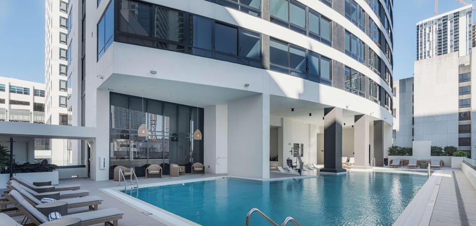 Resort-style rooftop pool with stunning Downtown Miami skyline views
