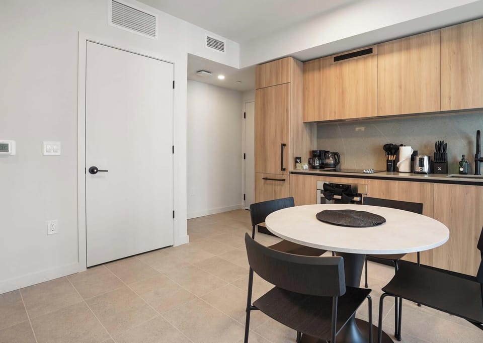 Fully stocked kitchen with dining table for four