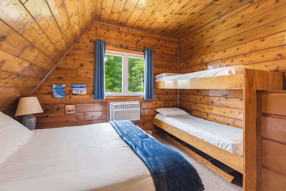 Family friendly bedroom offers sleeping space for kids and adults.