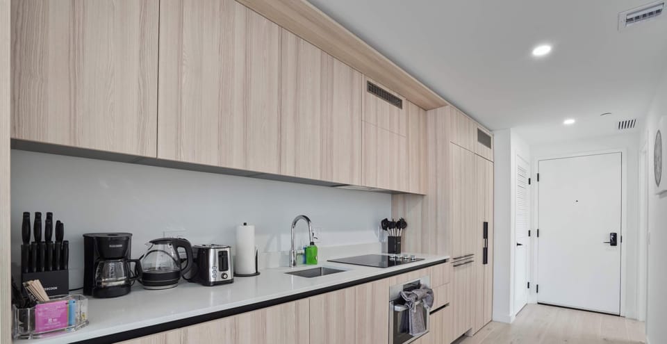 Fully equipped modern kitchen with premium appliances and ample counter space