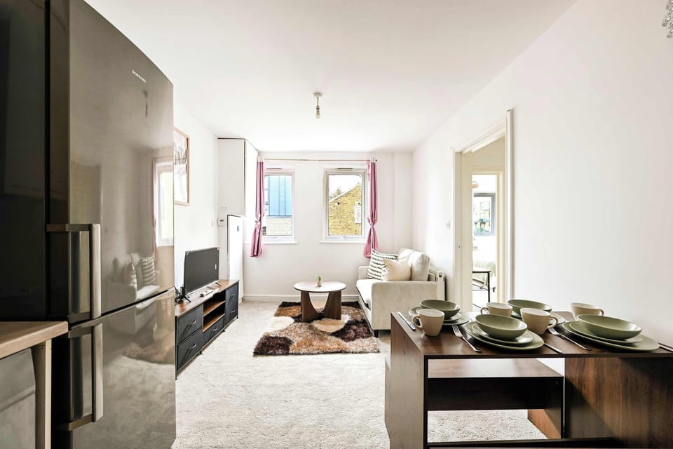 Living Room Retreat: Bright and airy space with stylish decor and views of Greater London!