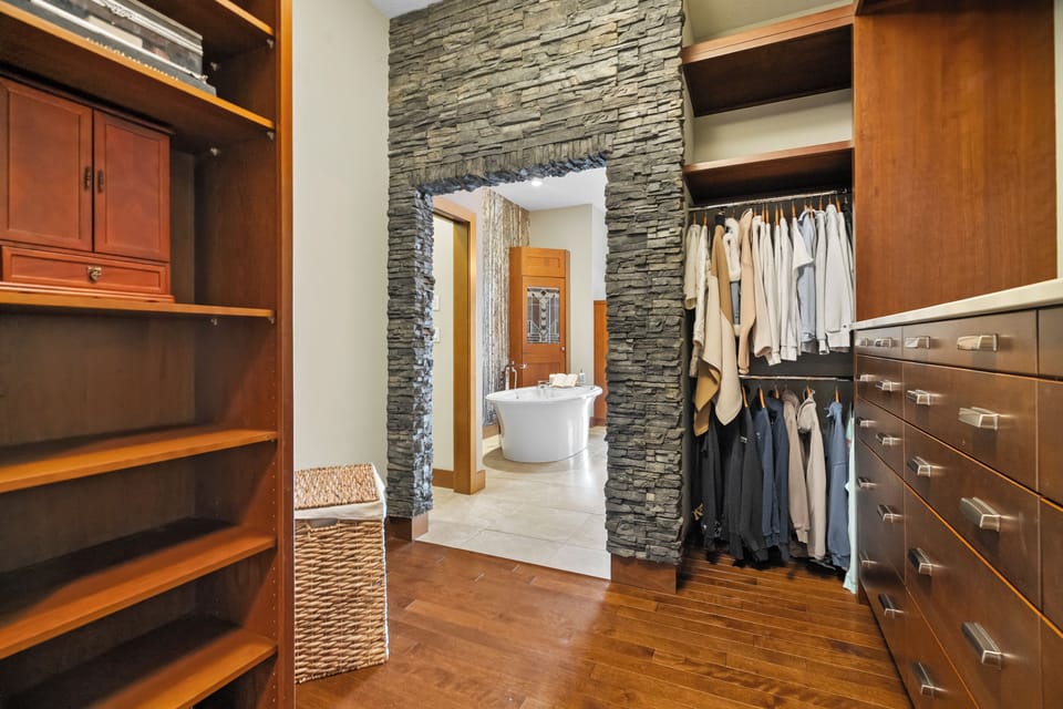 The walk in closet off the master suite. Hang your bags, unpack for the week & settle in properly.
