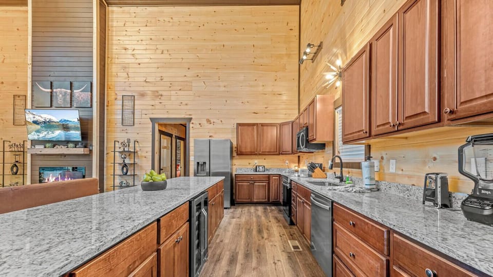 Cabin 1: Fully equipped kitchen designed for group cooking and shared meals.
