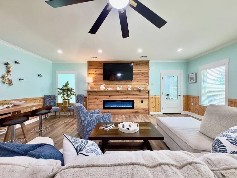 Our cheerful living area is perfect for unwinding by the fire.