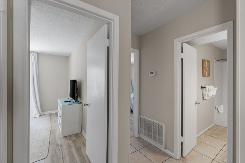 Freshly updated hallway connects your bedroom, bathroom, and living space—bright, clean, and easy to navigate throughout your stay.