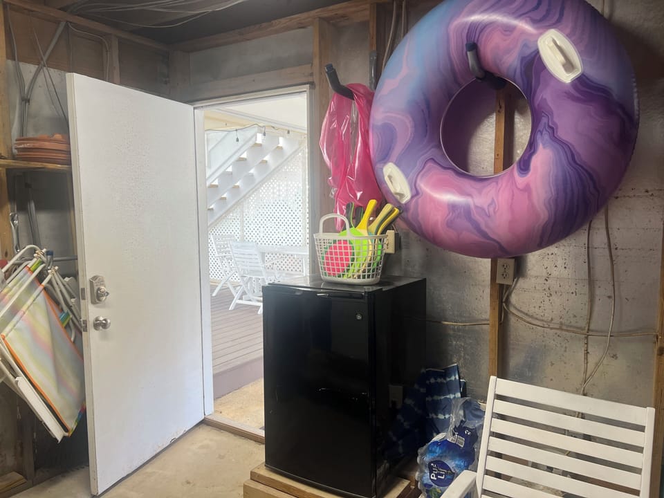 Your beach gear storage space keeps pool toys and essentials organized and ready for sunny adventures.