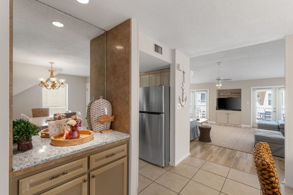 Open-concept living flows effortlessly from kitchen to bright, welcoming spaces where you can cook, entertain, and unwind all in one beautiful setting.