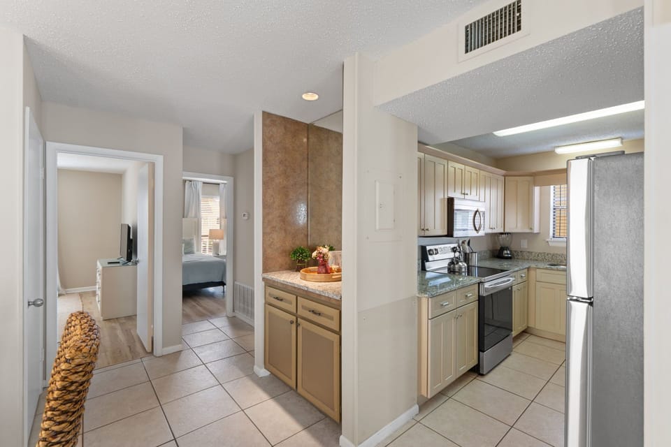Your kitchen comes fully equipped with granite countertops, stainless steel appliances, and all the modern conveniences you need to cook comfortably during your stay.