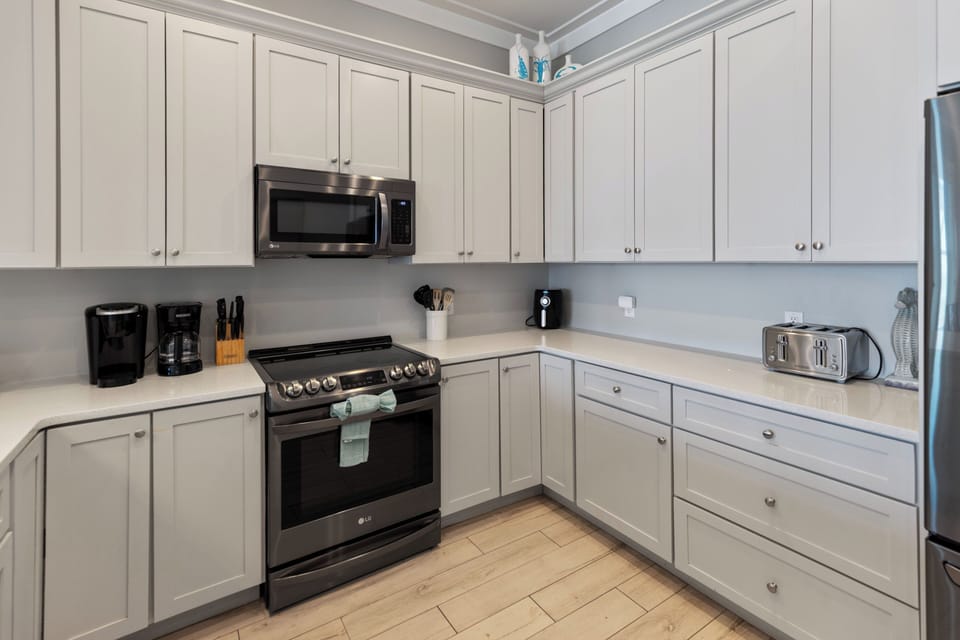 Your fully-equipped kitchen invites culinary adventures with modern appliances and ample counter space for preparing memorable meals.