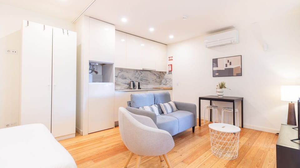 This versatile studio apartment combines comfort and functionality, featuring a cozy sofa, dining space, and a compact yet fully equipped kitchen, all designed for your utmost convenience.