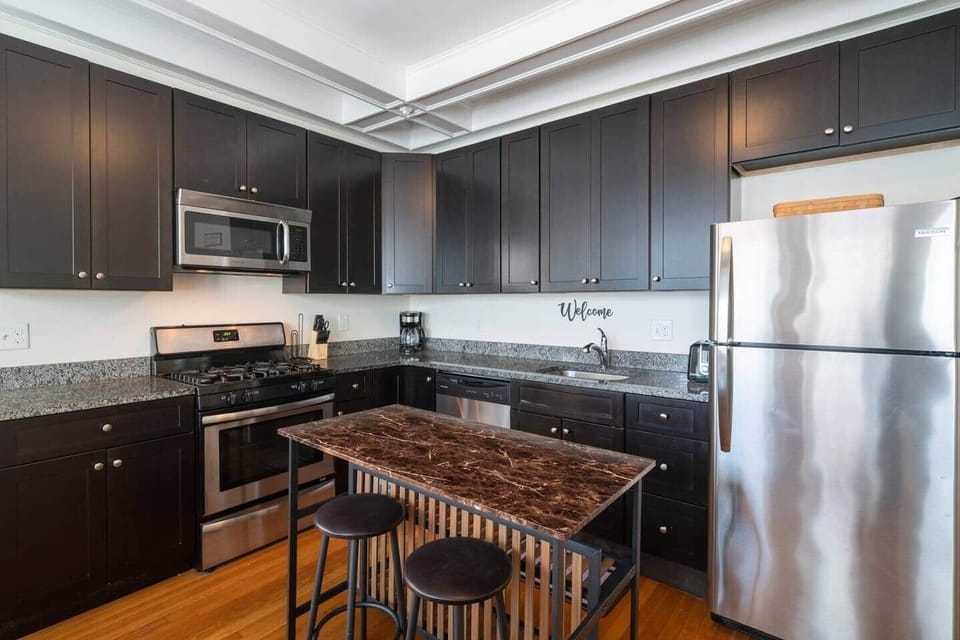Fully equipped kitchen includes cooking tools, toaster, crockpot, coffee maker and Keurig tea/coffee maker. 