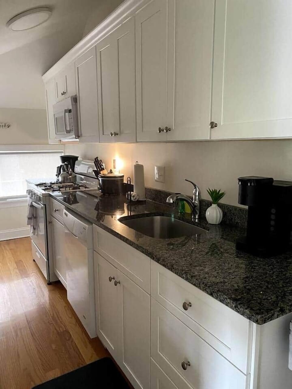 Plug in/removable motion censored dusk-dawn night light in kitchen area