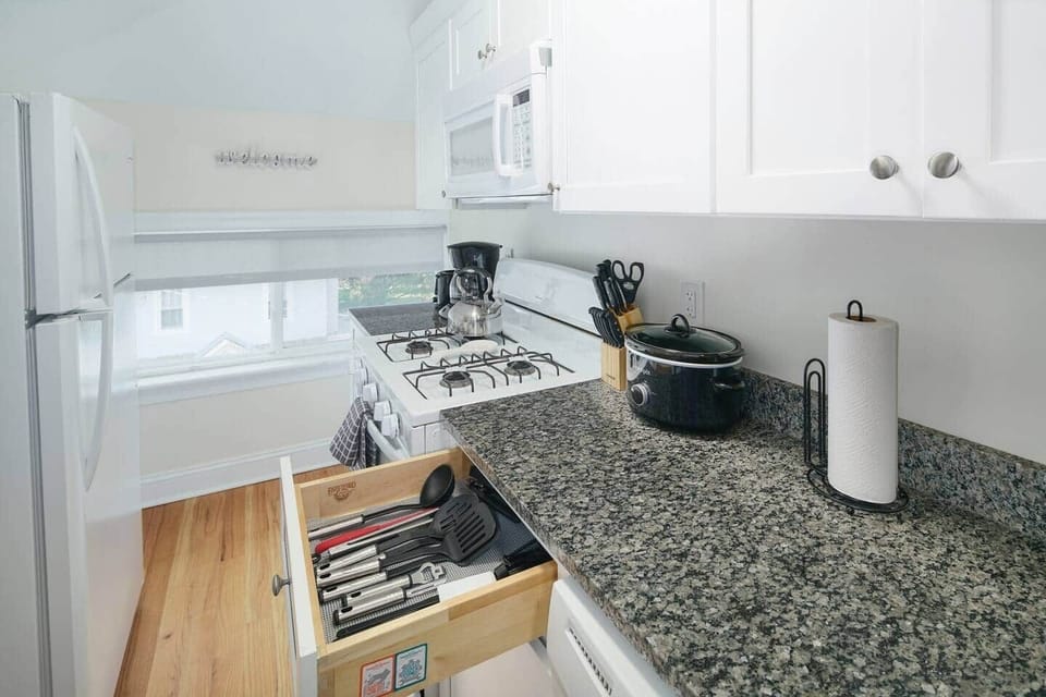 Fully equipped kitchen includes cooking tools, toaster, crockpot, coffee maker and Keurig tea/coffee maker. 