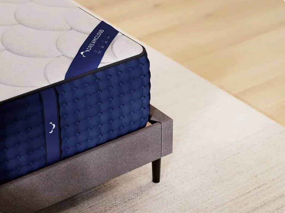 Queen size DREAMCLOUD luxury mattress in bedroom for a refreshing rest. 
