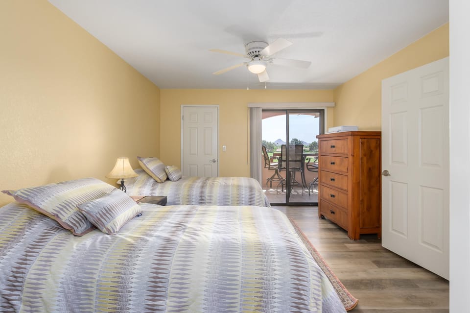 Bright and airy bedroom with private balcony access