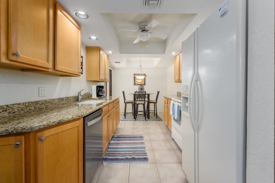 Bright, spacious kitchen with cozy dining nook for gatherings