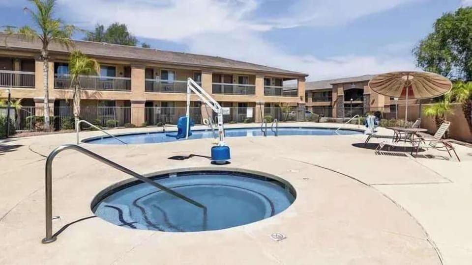 Enjoy a refreshing dip in the pool or relax in the hot tub under the sun.
