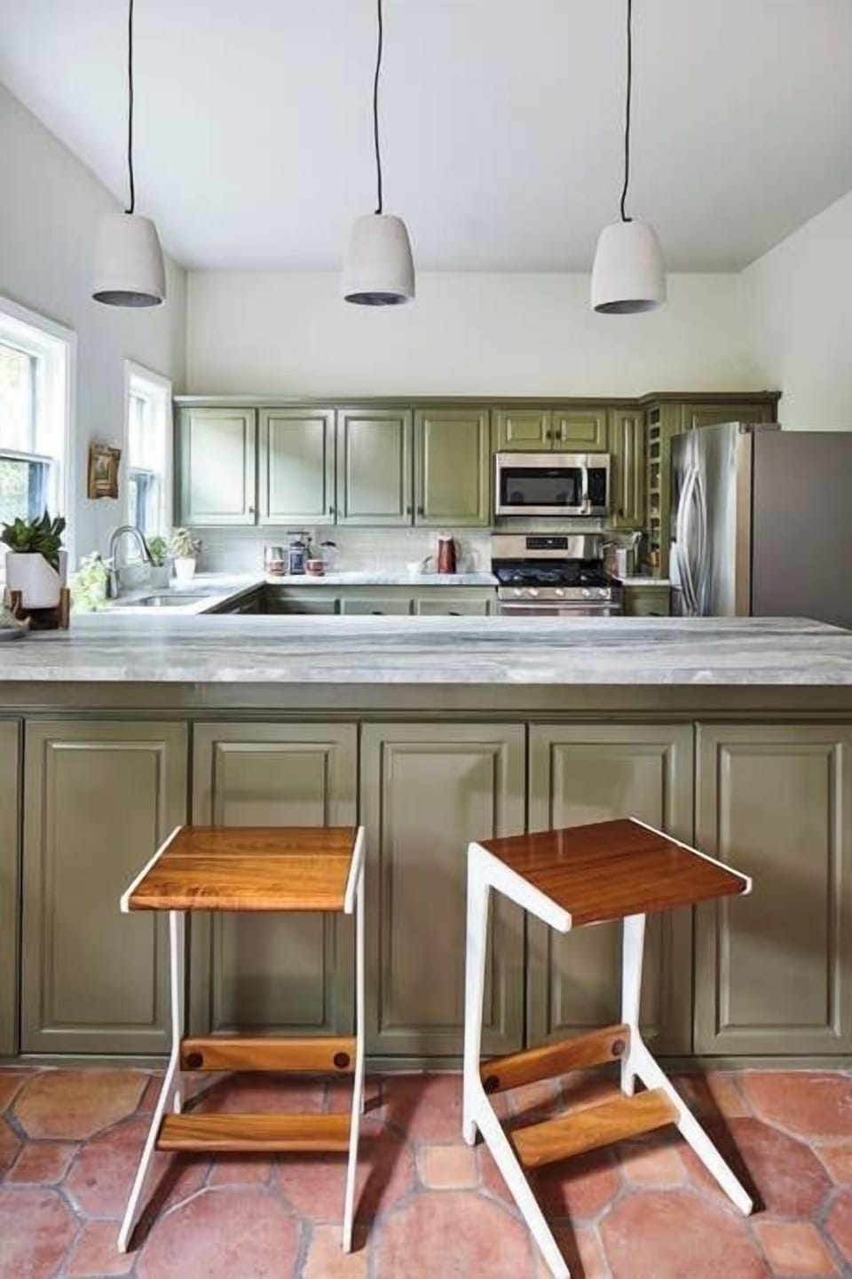 State of the art appliances, including a new gas range make cooking and entertaining in this apartment delightful. Meanwhile, the kitchen has plenty of room for guests to hang out.