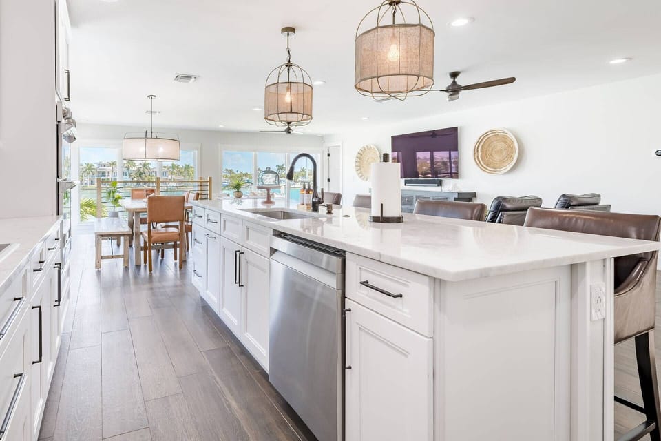 Featuring expansive countertops, stainless appliances, and all the essentials needed to prepare meals at home.