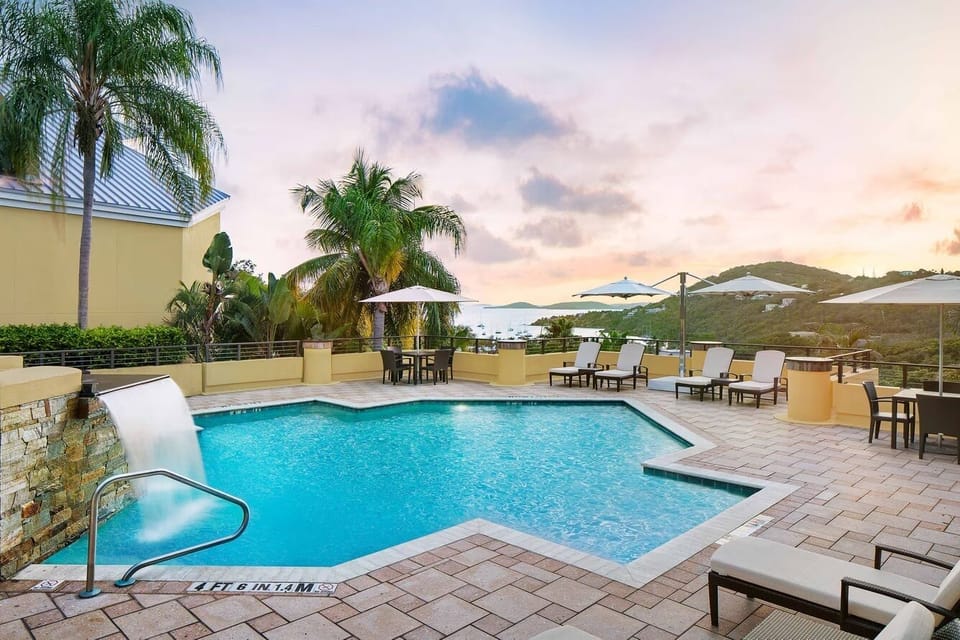 The Virgin Grand swimming pool offers a stunning view of the ocean.