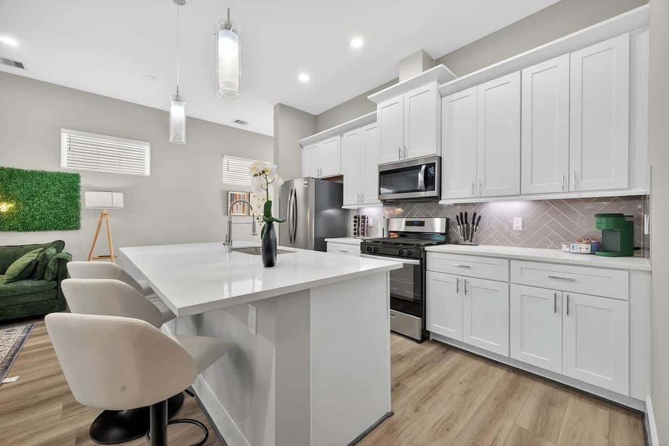 Gourmet Kitchen: Bright space with sleek appliances and an island perfect for entertaining!