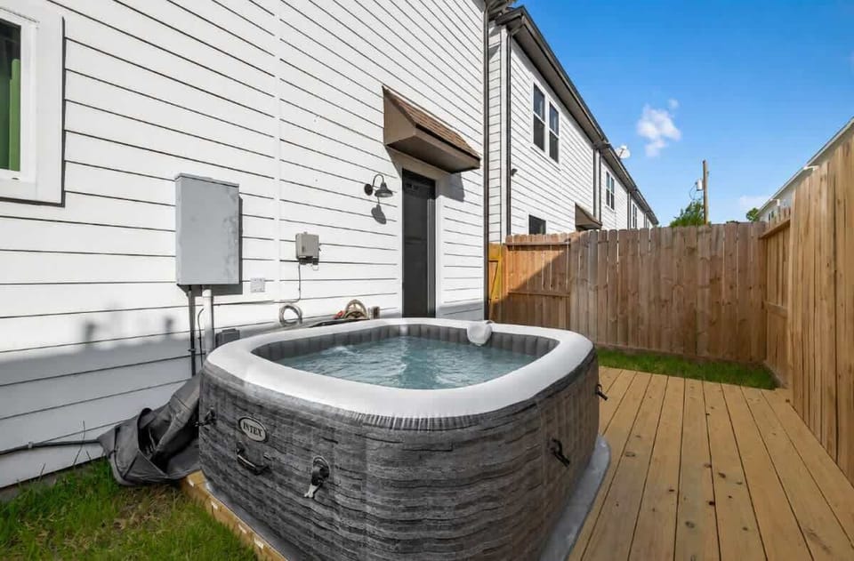 Outdoor Oasis: Soak in your private hot tub and enjoy the Texas sunshine in style!