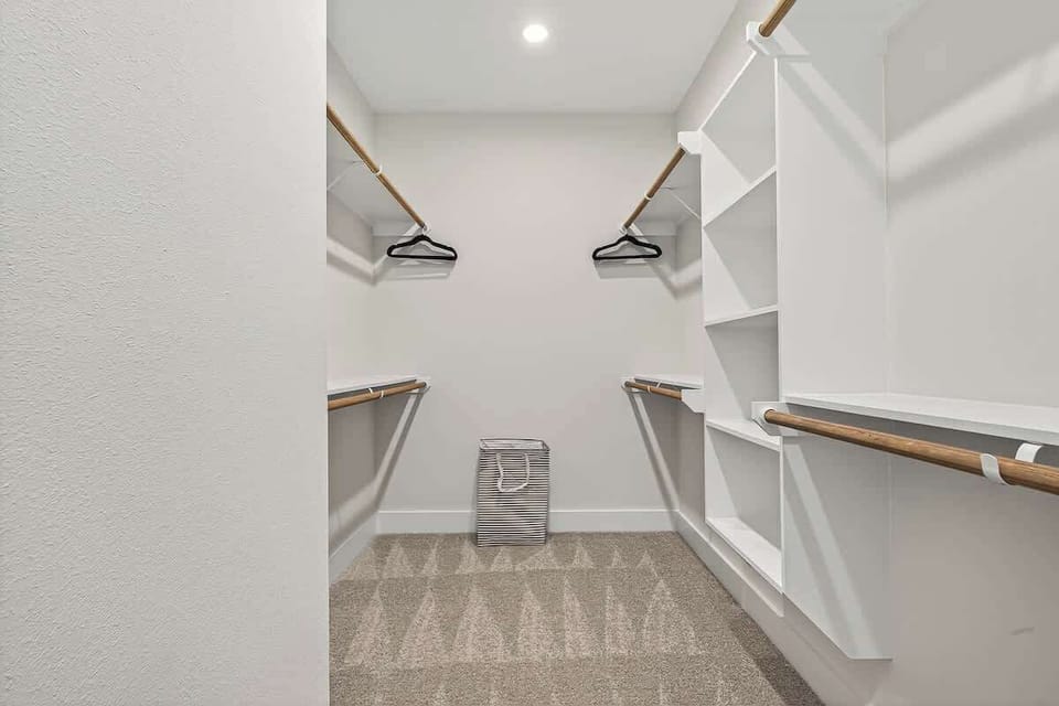 Ample hanging space and shelving to keep your stay organized.