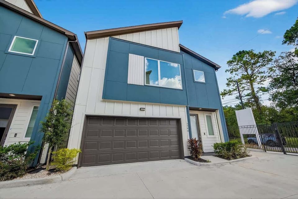 A stunning first look at your contemporary getaway, featuring clean lines and private garage parking.