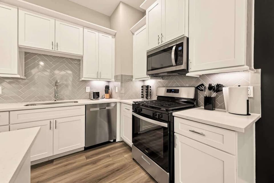 Modern, well-appointed kitchen with clean lines and upgraded appliances for a seamless cooking experience.