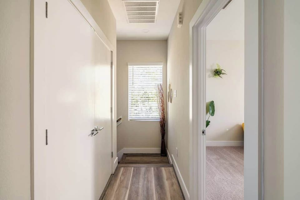 Entrance Hallway: Bright and inviting, with modern decor and cheerful natural light!