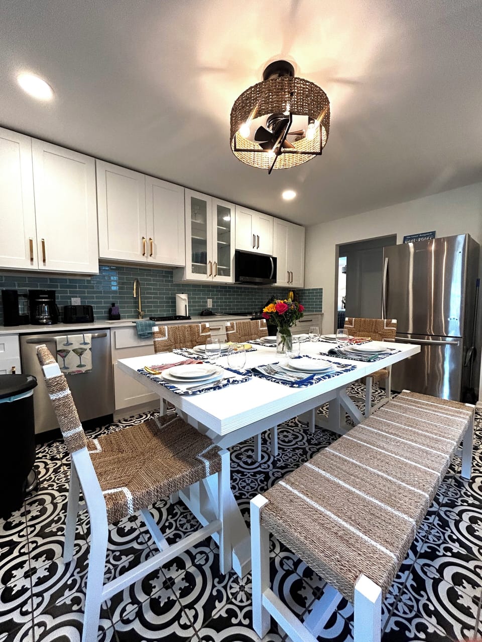 Kitchen table expands to fit 8, extension is stored in the washer/dryer room.