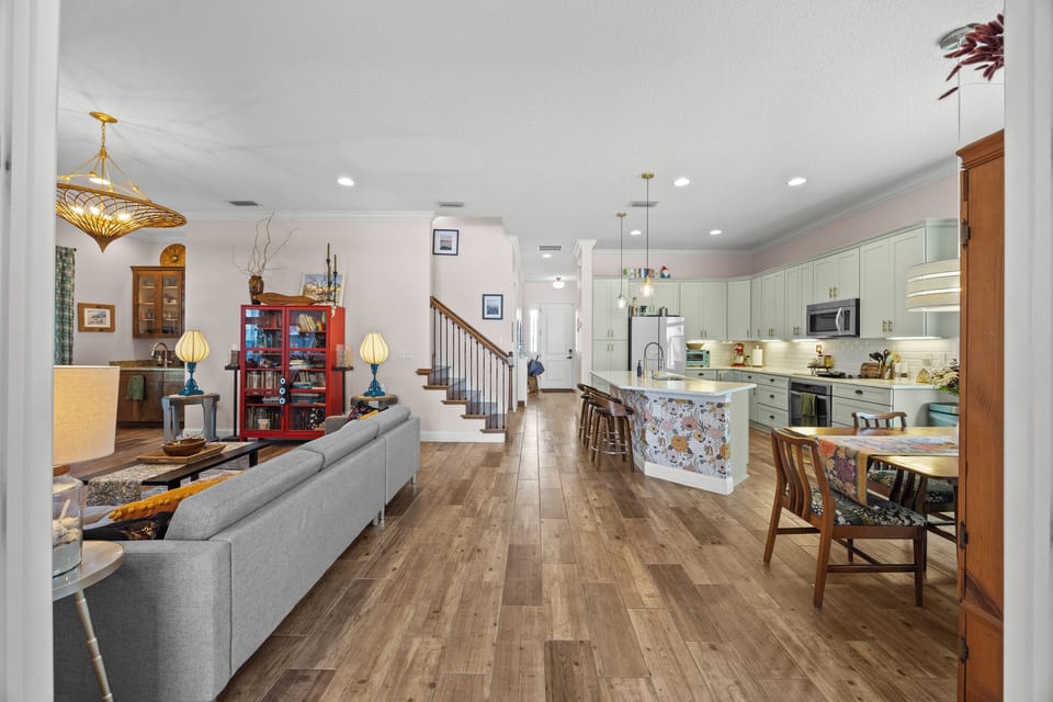 Spacious open‑concept living area with modern kitchen — ideal for families and groups.