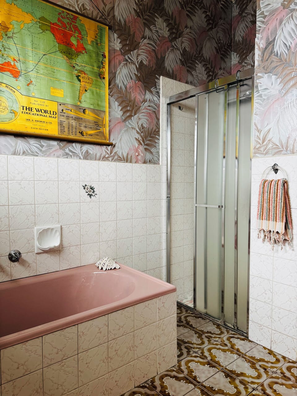 Shower with great water pressure in the shared bathroom.
