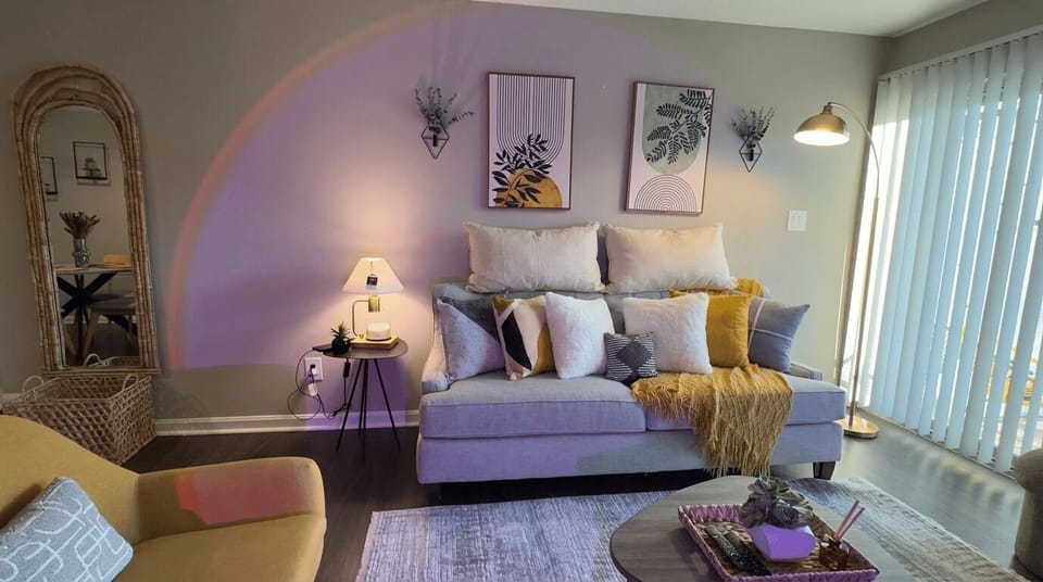 Cozy living room seating with botanical wall art