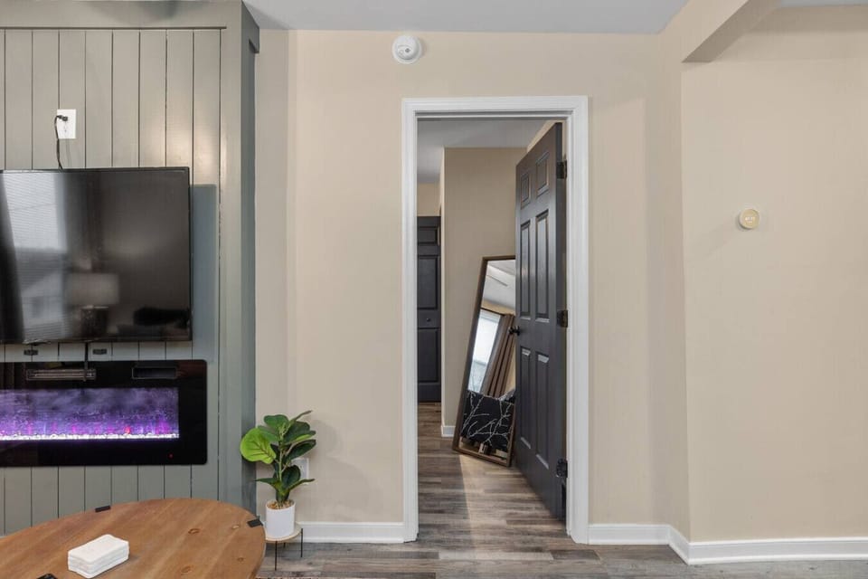 Peek inside the bedroom located right off the living room!