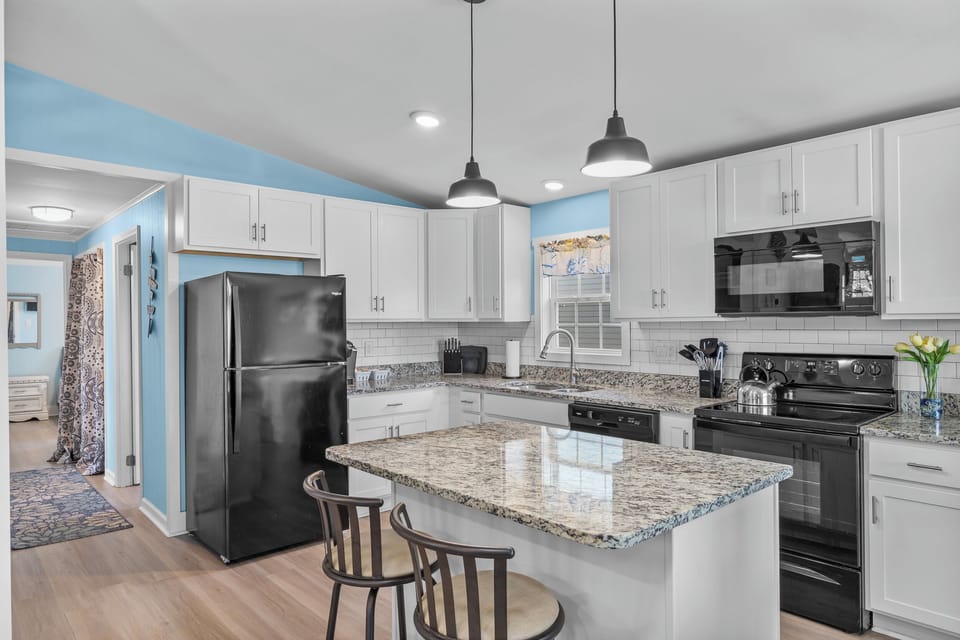 Spacious, fully stocked kitchen ready for family meals.