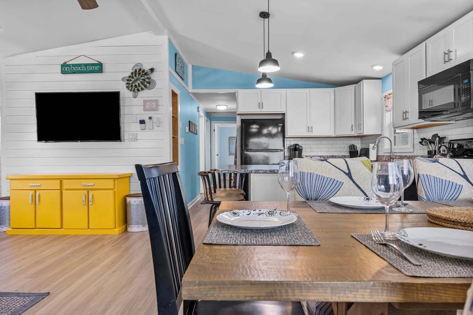 A cozy and comfortable dining space perfect for enjoying breakfast before the beach or dinner after exploring Surf City
