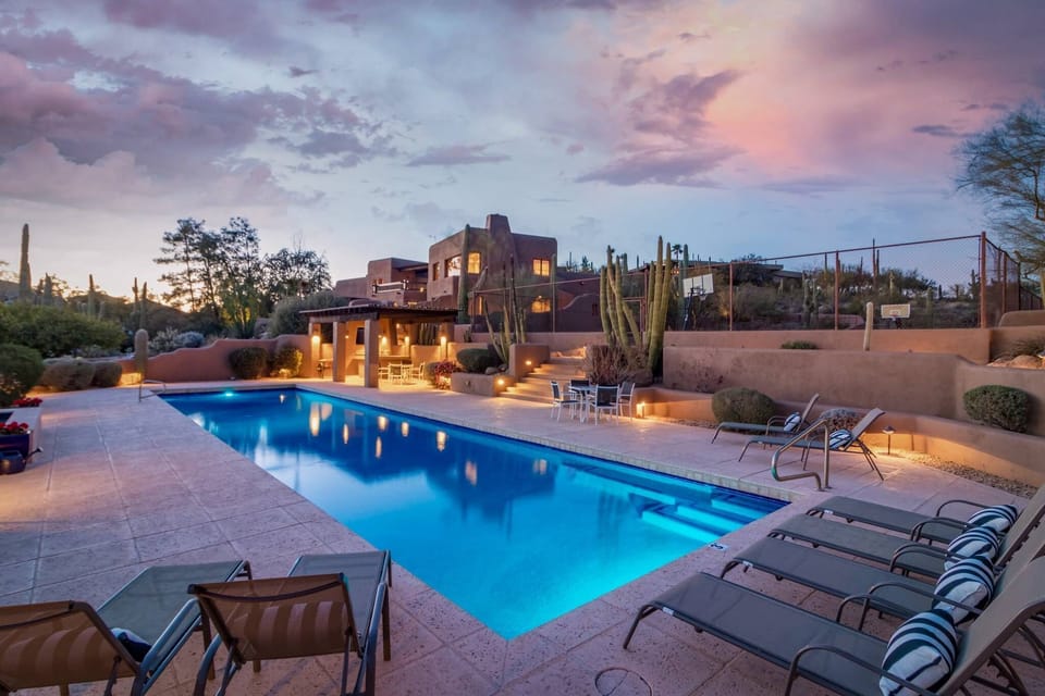 Lounge by this luxurious pool!