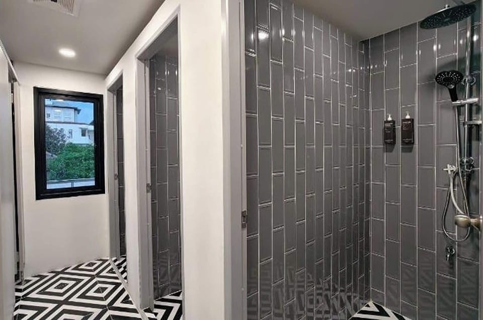 Shower, rainfall showerhead, free toiletries, hair dryer