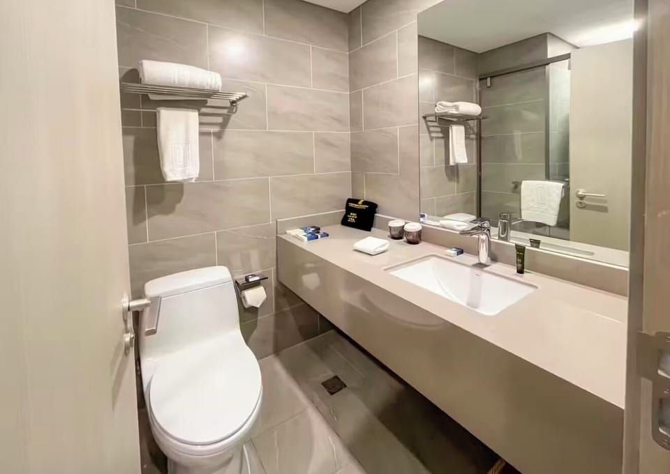 Hair dryer, slippers, towels, soap