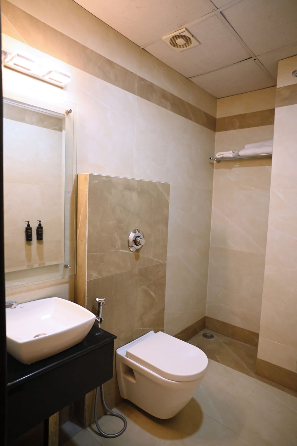 Shower, free toiletries, towels, soap