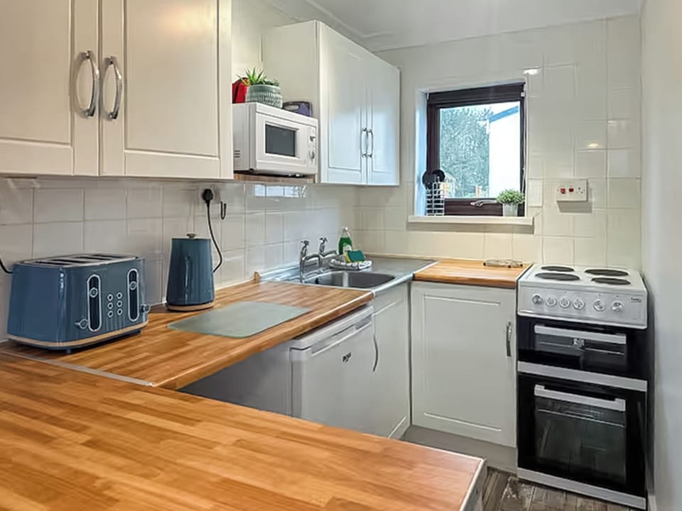Kitchen area | Chalet 12Coastlands Holiday Park, Manorbier