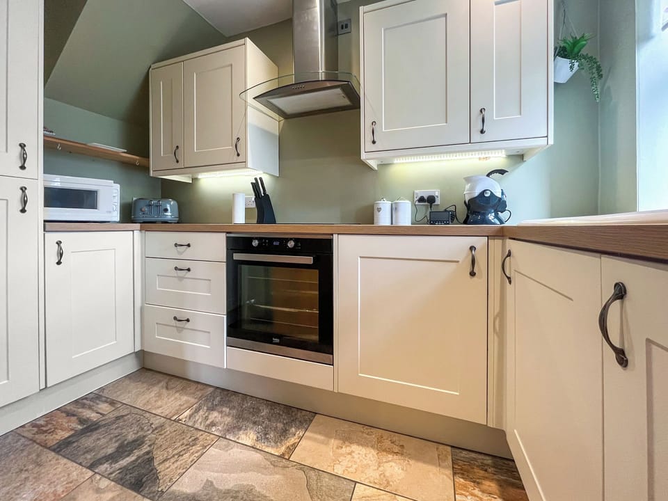 Kitchen | Caterpillar Cottage, Kelbrook