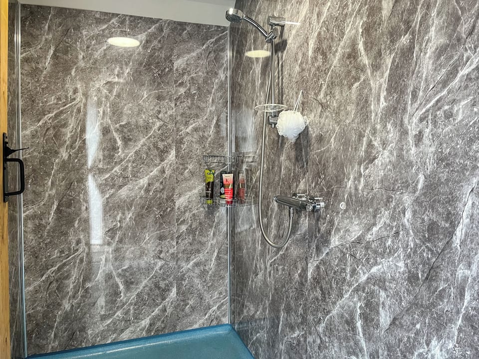 Shower room | Ember Sky Yurt - Redstead Accomodation, Beadnell