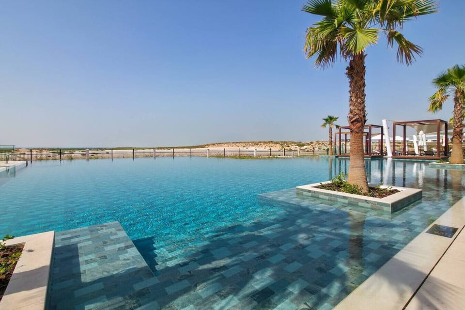 Modern outdoor swimming pool with a clean, refreshing ambiance