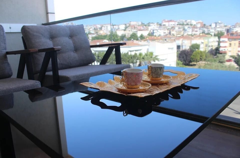 Deluxe Room, Balcony, City View | Outdoor dining
