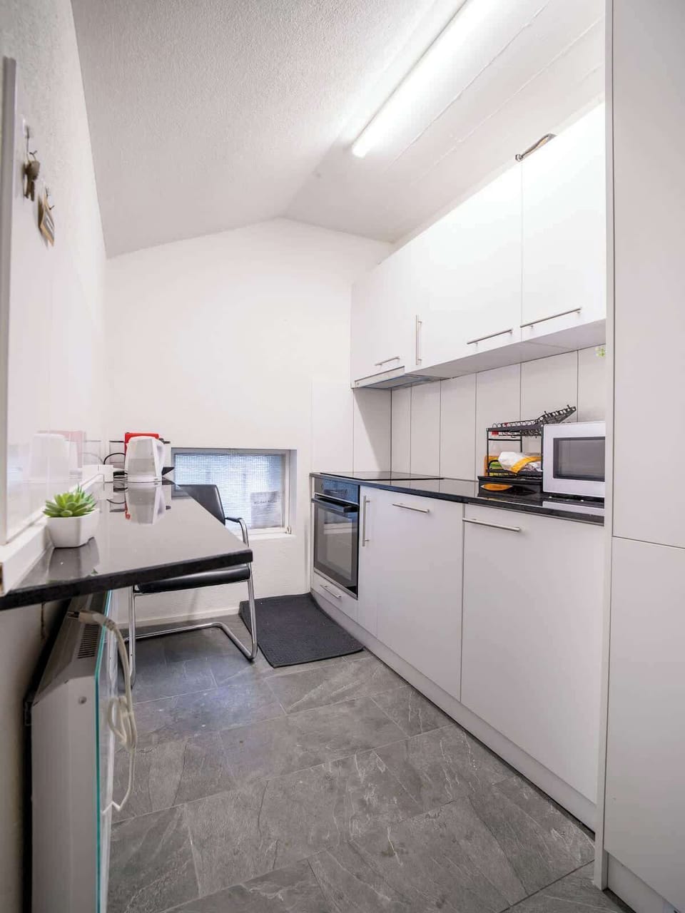 Fully equipped shared kitchen with modern appliances