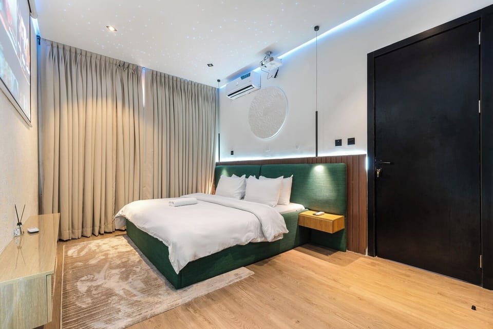 Economy Room, Balcony, City View | Desk, laptop workspace, blackout drapes, soundproofing